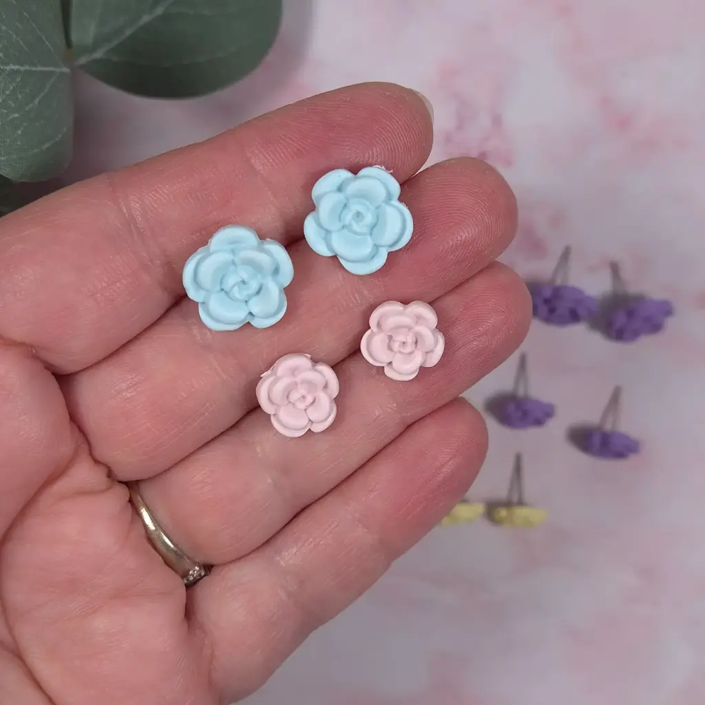Puces d'Oreilles Roses Enfant (Bleu)